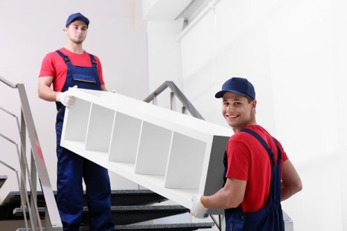 Man and van moving boxes and furniture in a St Johns Wood residential street