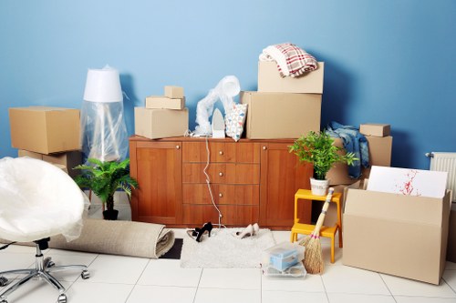 House removal team planning a move in St Johns Wood residential street
