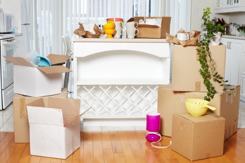 Household boxes and furniture being loaded for a local move in St Johns Wood