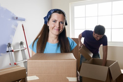 Packed boxes and furniture prepared for removal truck transport