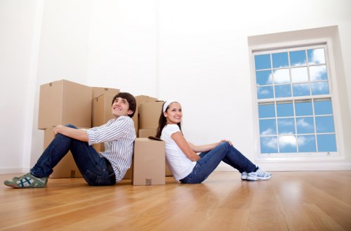 Local office relocation planning with packing boxes and desks
