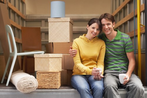 Moving crew loading furniture into a van