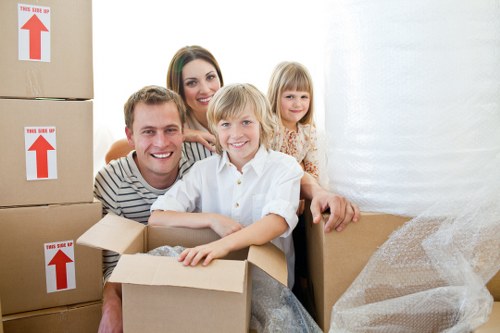 Packed boxes and furniture loaded into a van for a local move