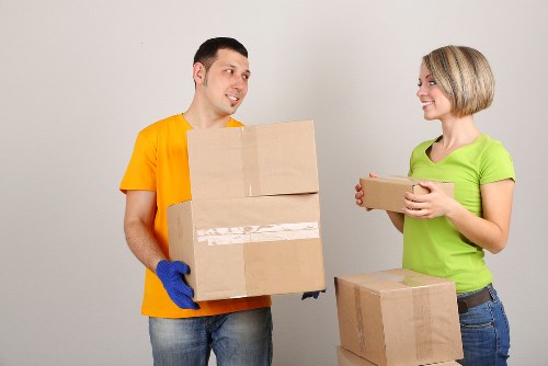 Unpacking and organising boxes in a bright St Johns Wood property